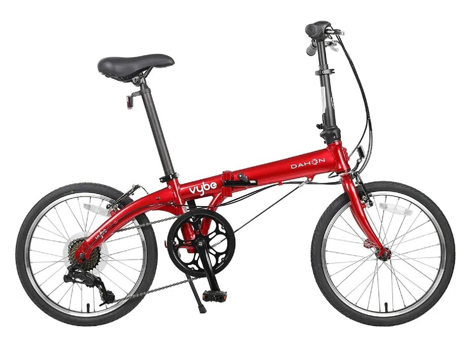 Sta op dennenboom langs Dahon Vybe D7 Folding Bike I Nyc Bicycle Shop